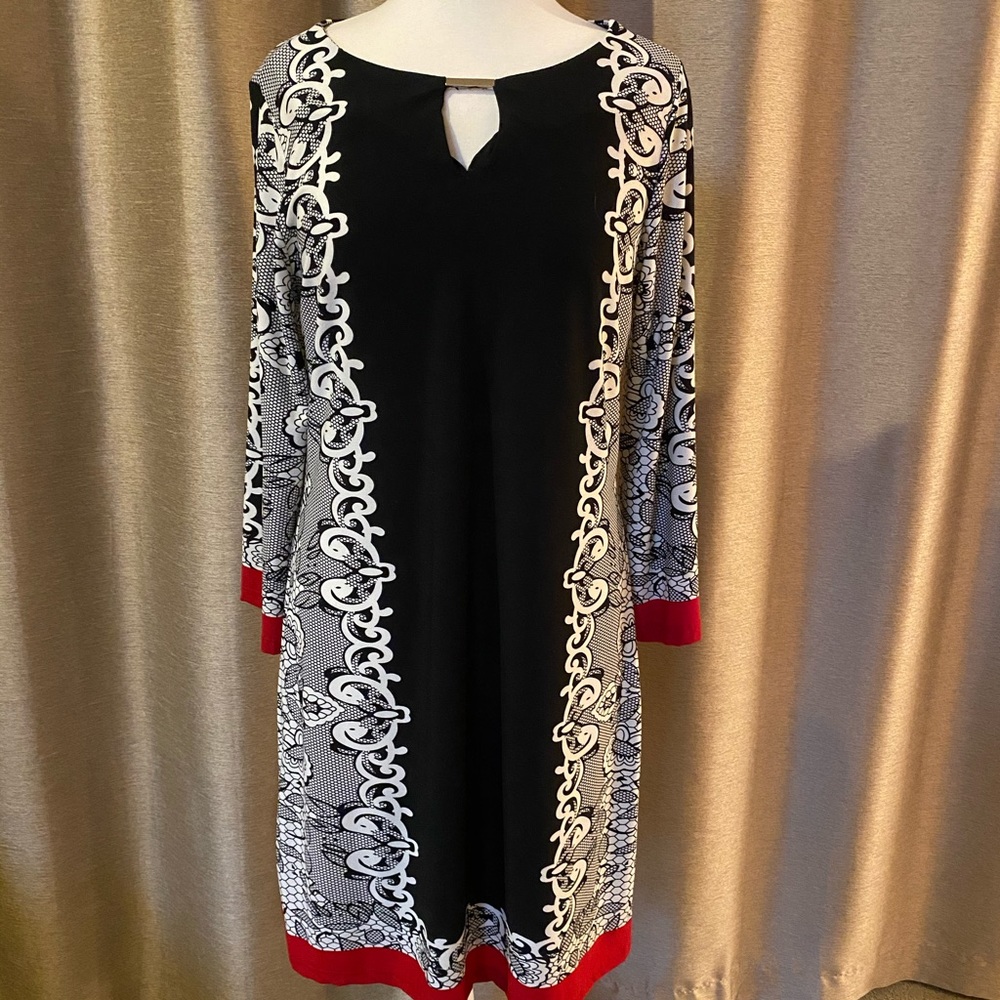 ¾ length sleeve day dress.